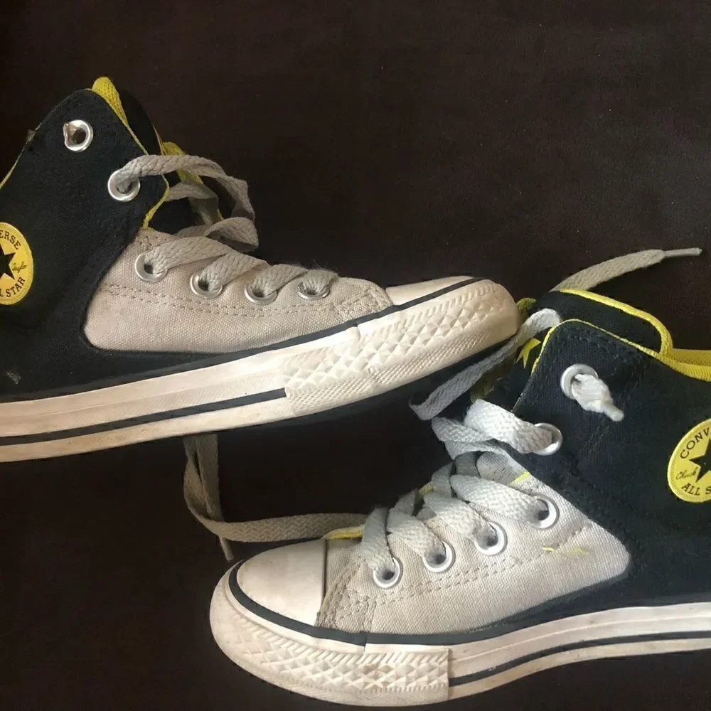 Boys all-star converse sneakers size 1 black and yellow.